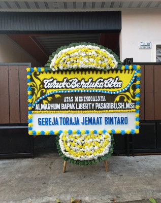 Papan Bunga Duka di Salak